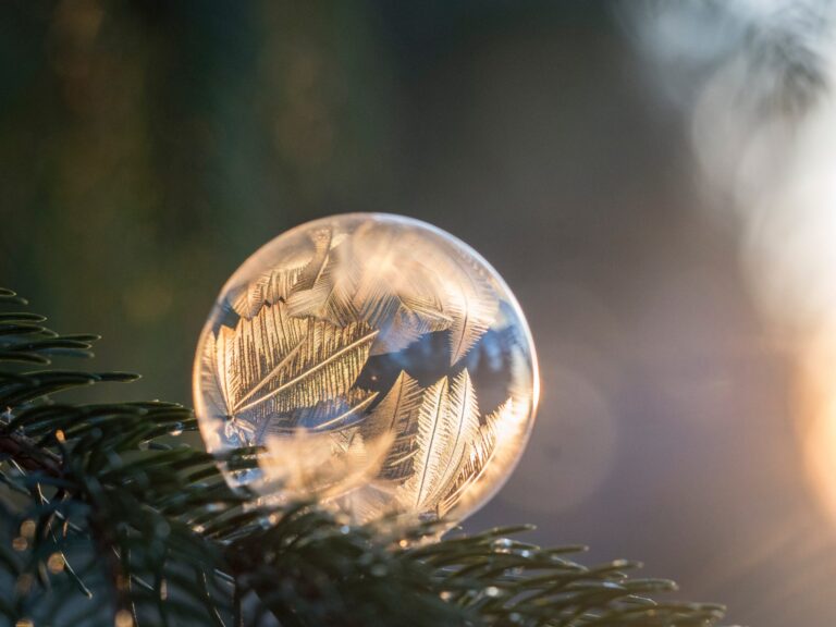Frozen soap bubble with intricate patterns, symbolizing mindful attention and calm