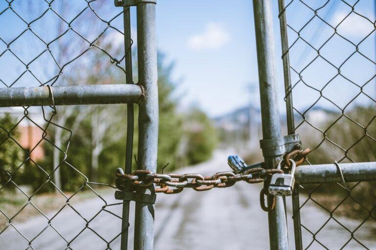 cyclone fence in shallow photography